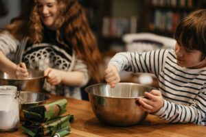 kids learning to cook allergy friendly meals at home