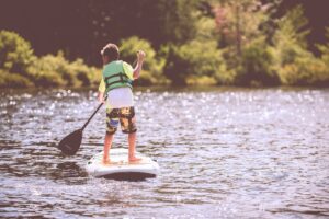 Child building confidence and independence at summer camp