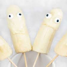 allergy-friendly Halloween treats of coconut yogurt dipped bananas