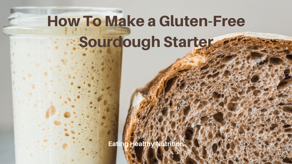 Active gluten-free sourdough starter in a glass jar next to baked gluten-free sourdough bread