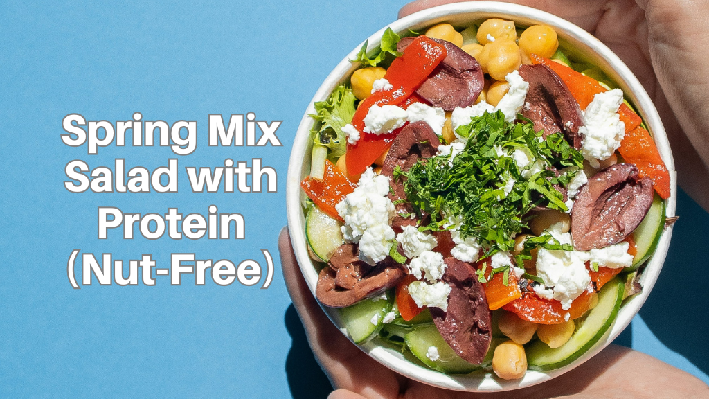Spring mix salad with chickpeas, vegetables, and cheese in a bowl, nut-free high protein salad