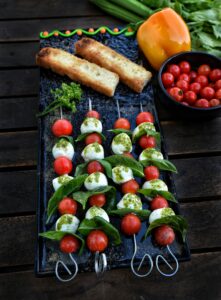 tomato, mozzarella and basil skewers with nut free pesto