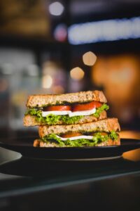 nut free pesto on tomato and mozzarella sandwich